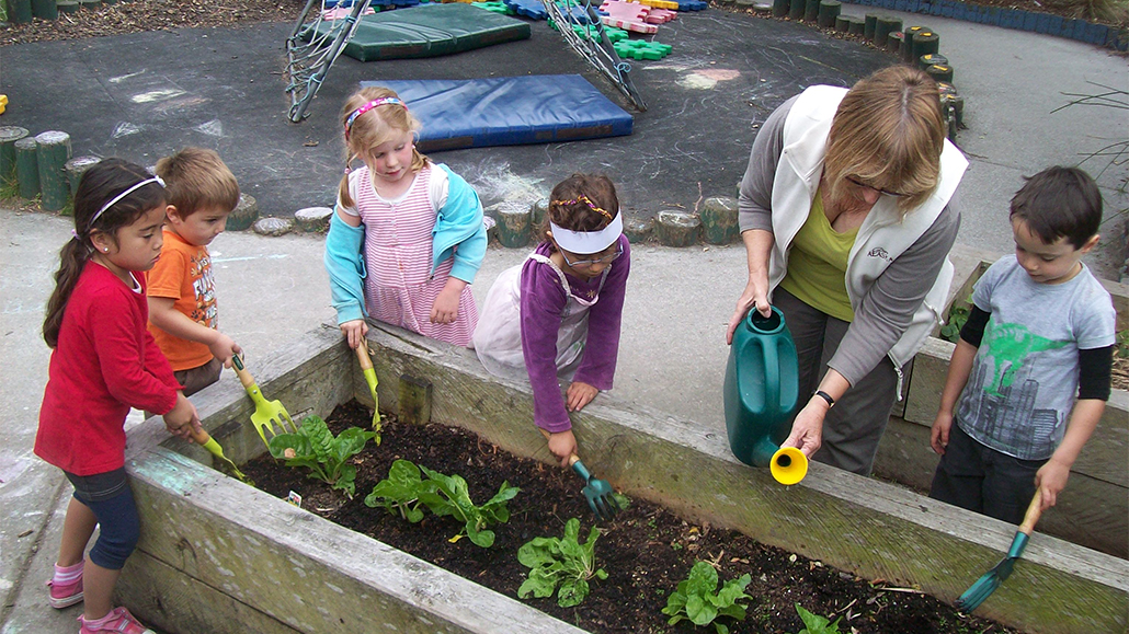 Tending to the garden at Kidsfirst South Brighton